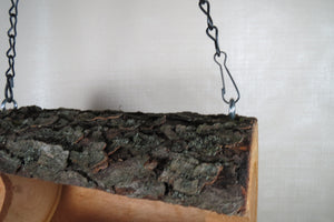 detail of chain on bird feeder made by Schoolhouse Woodcrafts