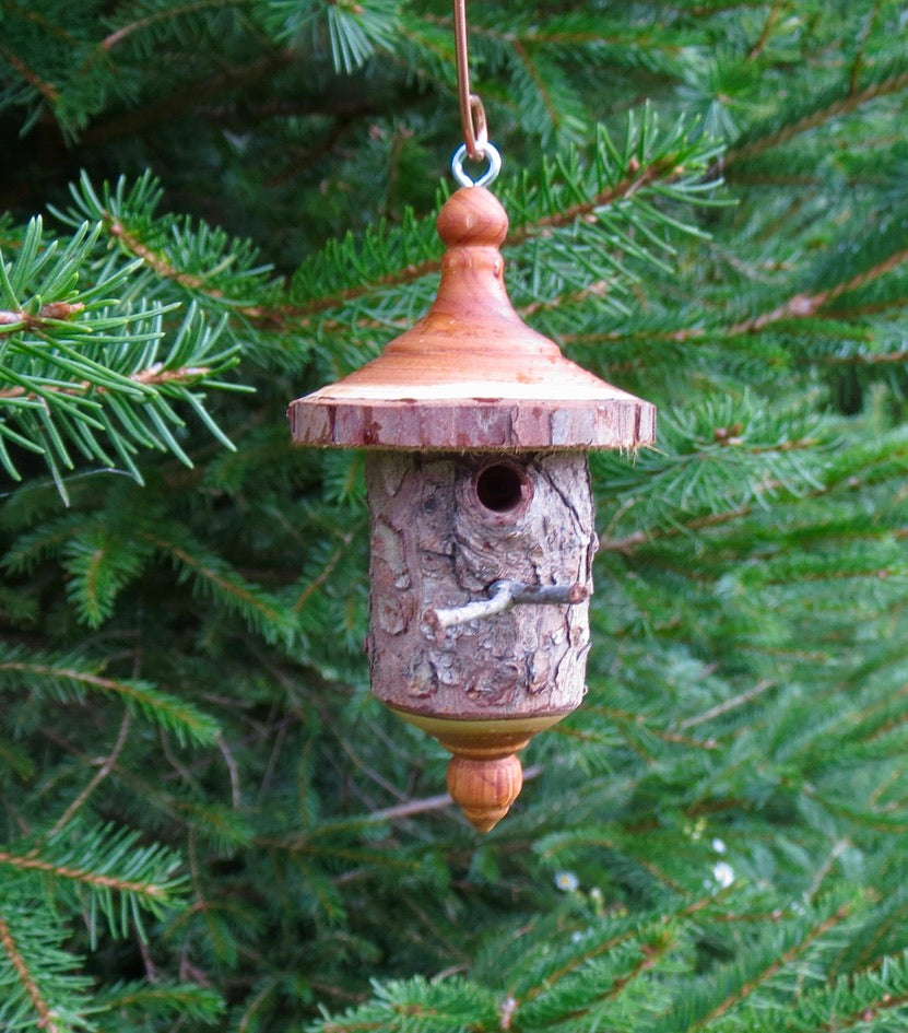 Turned birdhouse ornaments designed and created by Schoolhouse Woodcrafts