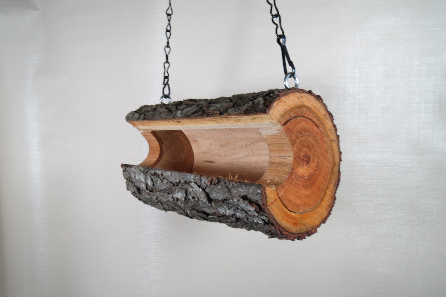 hanging log bird feeder from Schoolhouse Woodcrafts