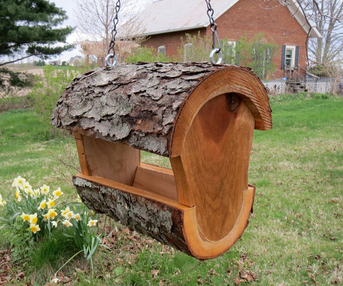 Fly-through bird feeder from schoolhousewoodcrafts.com