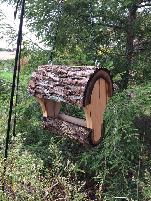 Walnut fly-through feeder, designed and created by Schoolhouse Woodcrafts